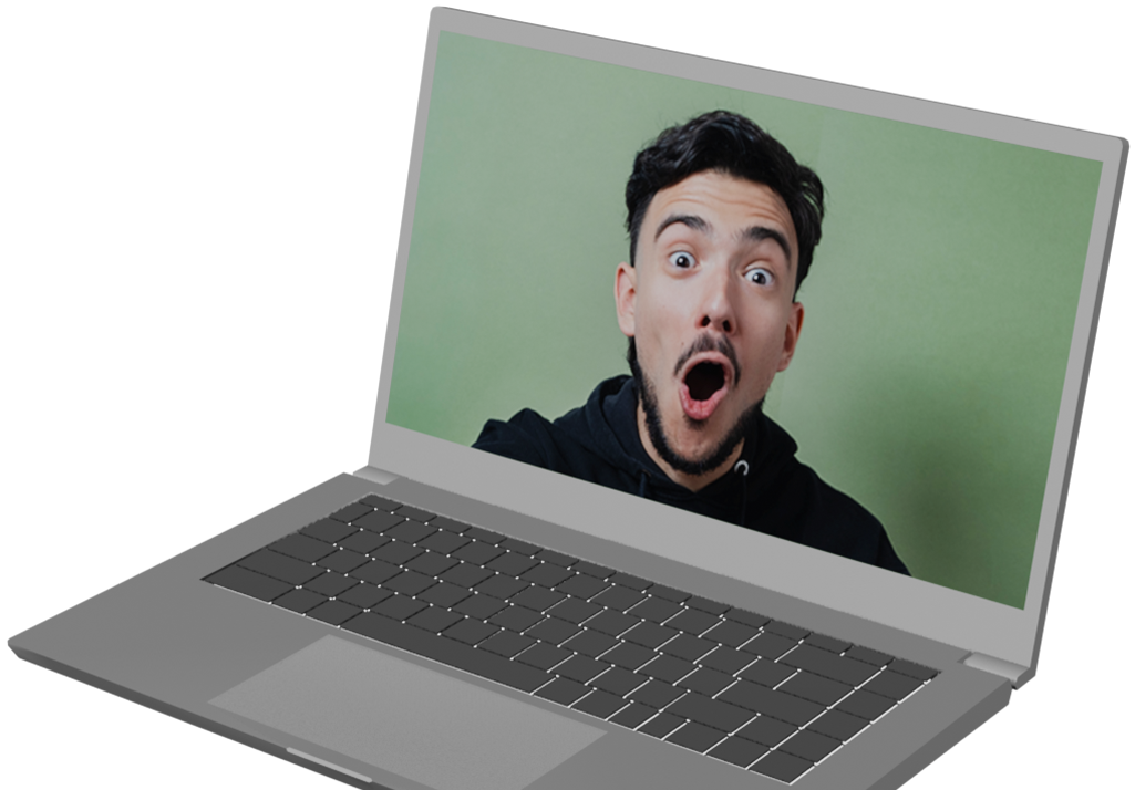 Computador portátil aberto, onde se vê no ecrã Guilherme Costa com um ar surpreendido.